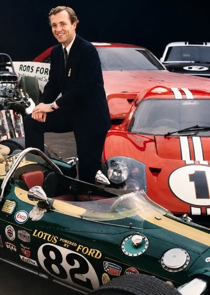Studio portrait with a Lotus Powered by Ford Indy car numbered 82 and a Ford GT40 numbered 1