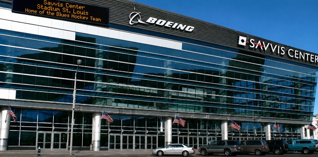 Exterior of Savvis Center in St. Louis with LED marquee, Boeing logo, SAVVIS CENTER signage, American flags and parked cars