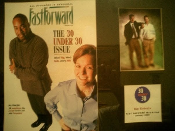 FastForward magazine 'The 30 Under 30 Issue,' January 2000, with a framed photo of Tim Roberts and a '30 Under 30 · Tim Roberts · Fast Forward Magazine · January 2000' label